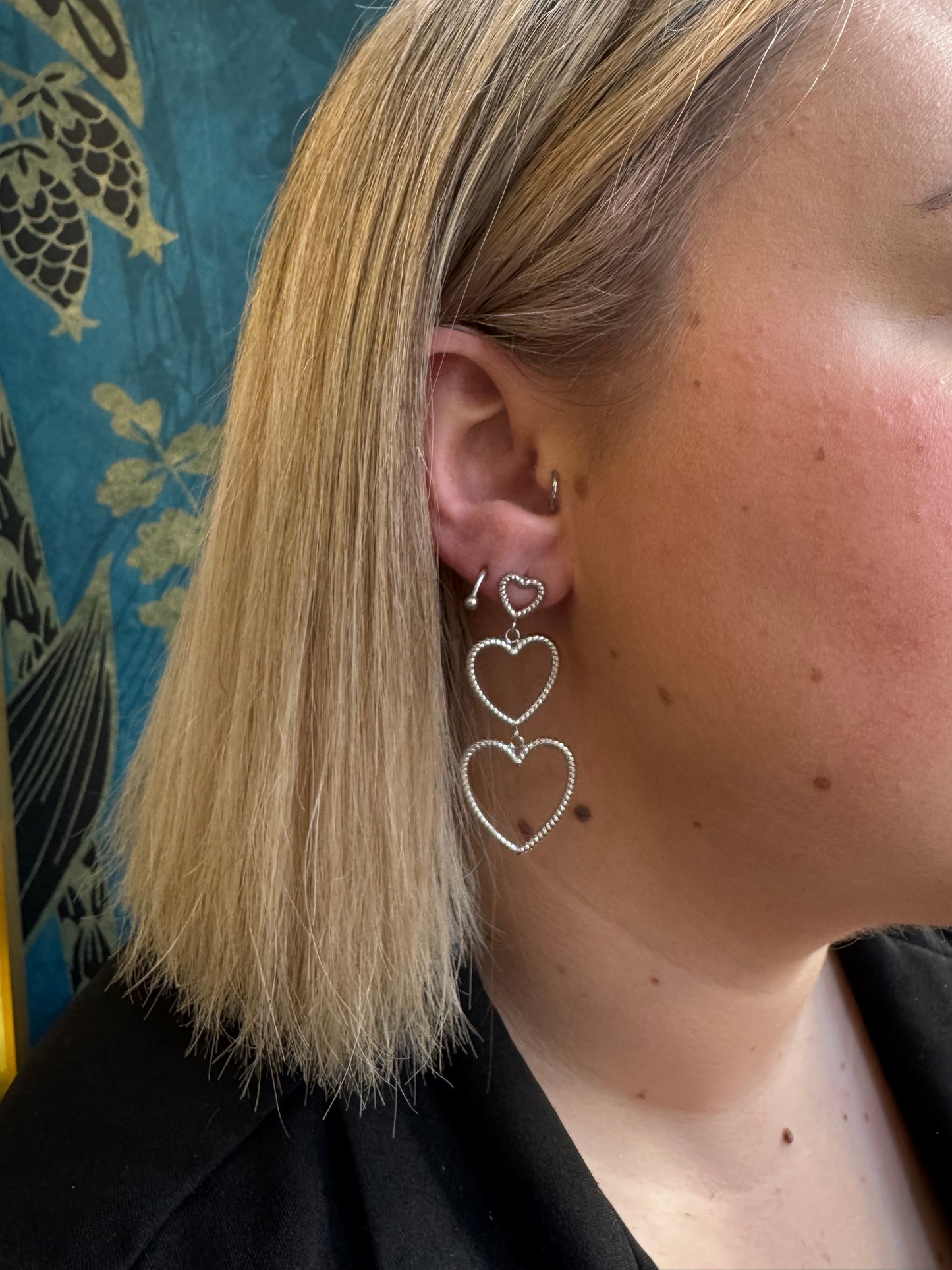 Boucles d'oreilles cœurs argentés