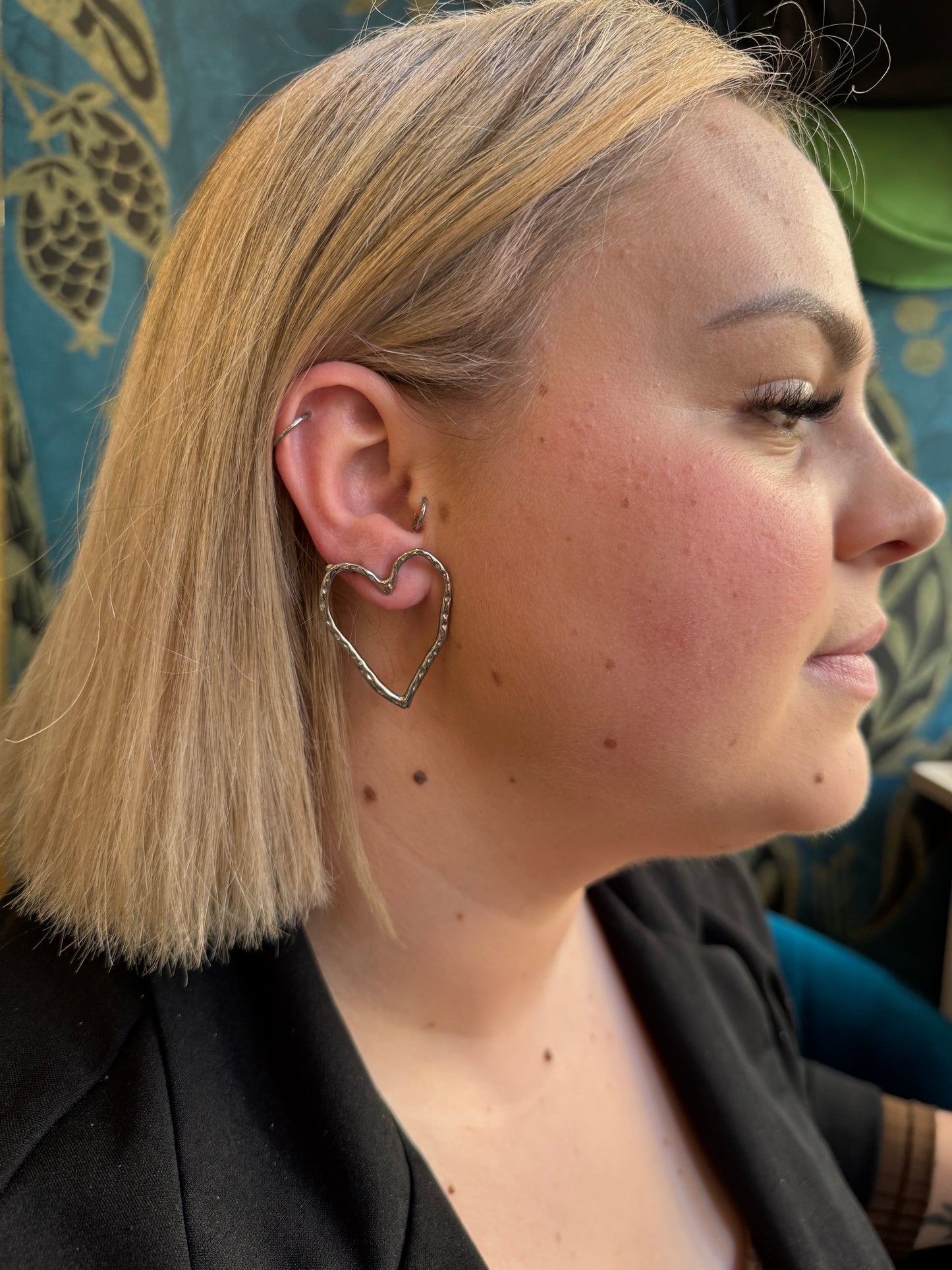 Boucles d'oreilles coeurs argentées