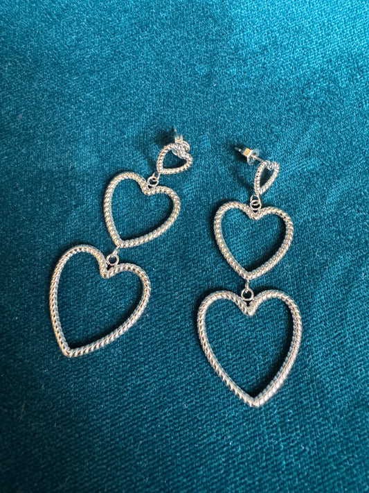 Boucles d'oreilles cœurs argentés